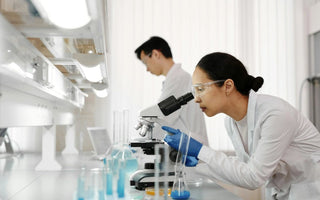 A lab technician doing quality control tests.