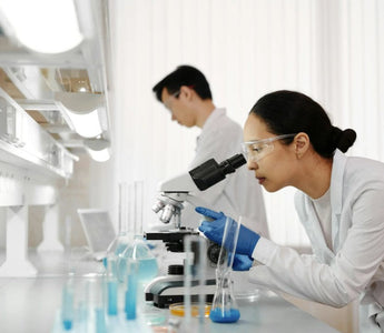 A lab technician doing quality control tests.