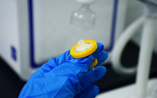 Person Holding a 0.22um Syringe Filter