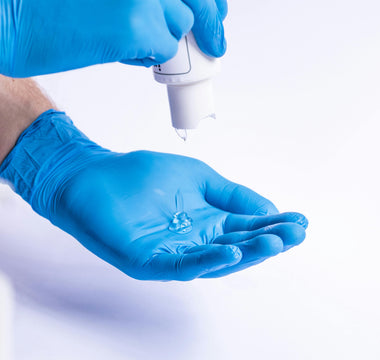 Person Pouring Gel Into Hand